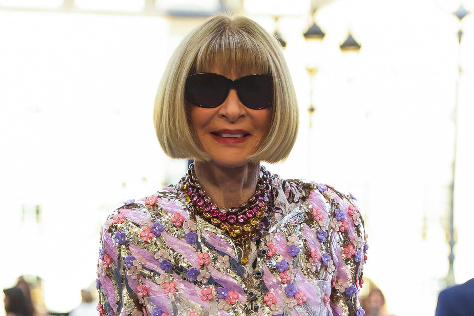 Anna Wintour poses during a photocall for the Vogue World fashion show, one month before the 2024 Paris Olympic Games.