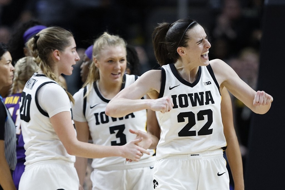 Caitlin Clark (r) has fans nationwide eagerly awaiting her professional debut, curious to see if she can carry her college success into the pro ranks.