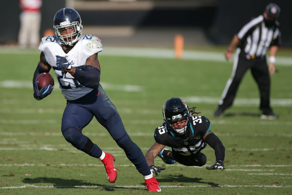 Derrick Henry (l) of the Titans could have his second-straight 2,000-yard season as Tennessee looks to win another division crown in 2021.