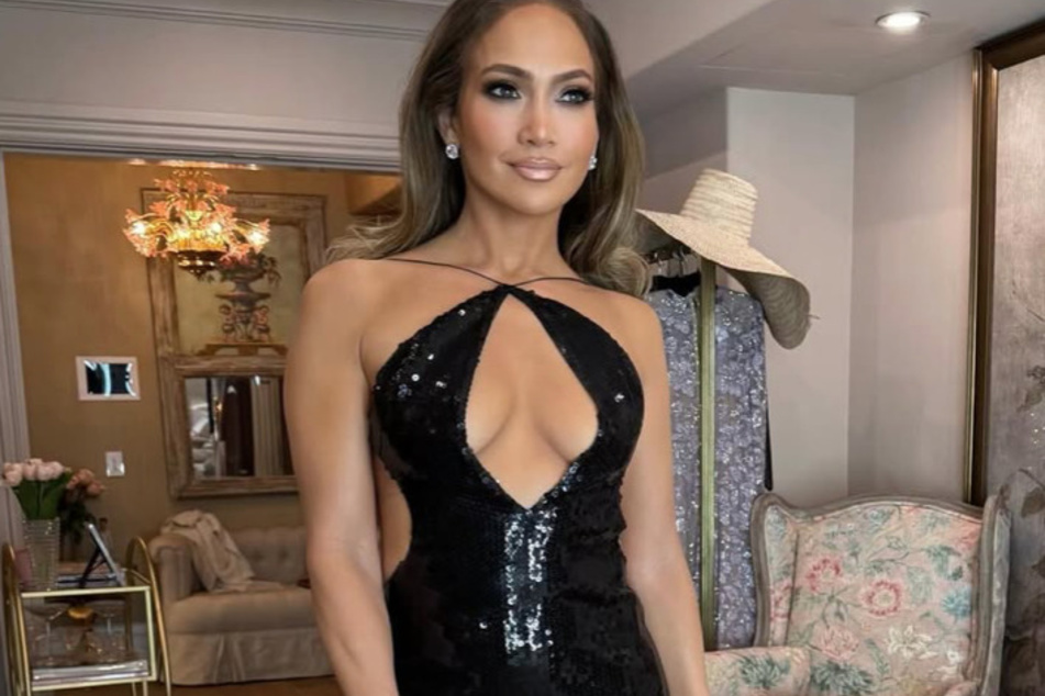 Jennifer Lopez makes revenge look hot in her glamorous holiday gown.
