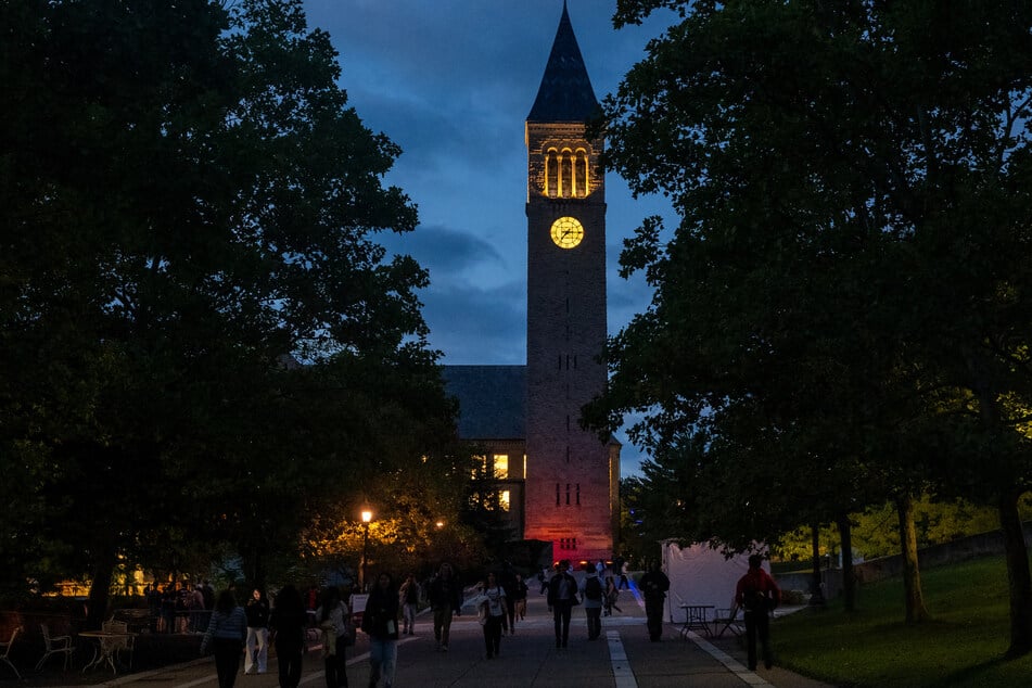 Students walk on the campus of Cornell University on September 29 in Ithaca, New York. The alleged gang rape that occurred at the school two years ago has drawn nationwide attention after a civil lawsuit was filed.