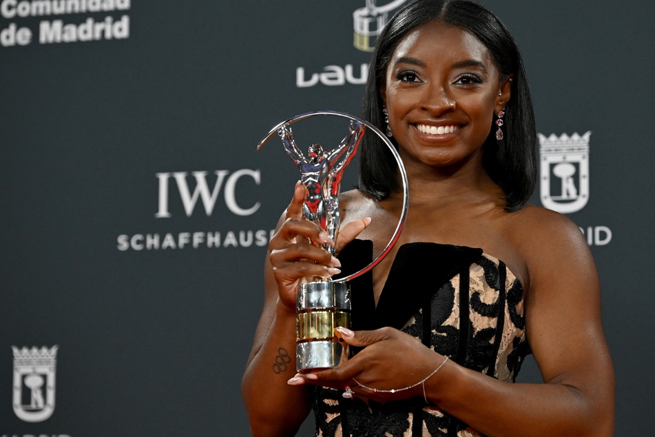 Simone Biles poses with her Sportswoman of the Year award during the 26th Laureus World Sports Awards gala in Madrid on April 21, 2025.