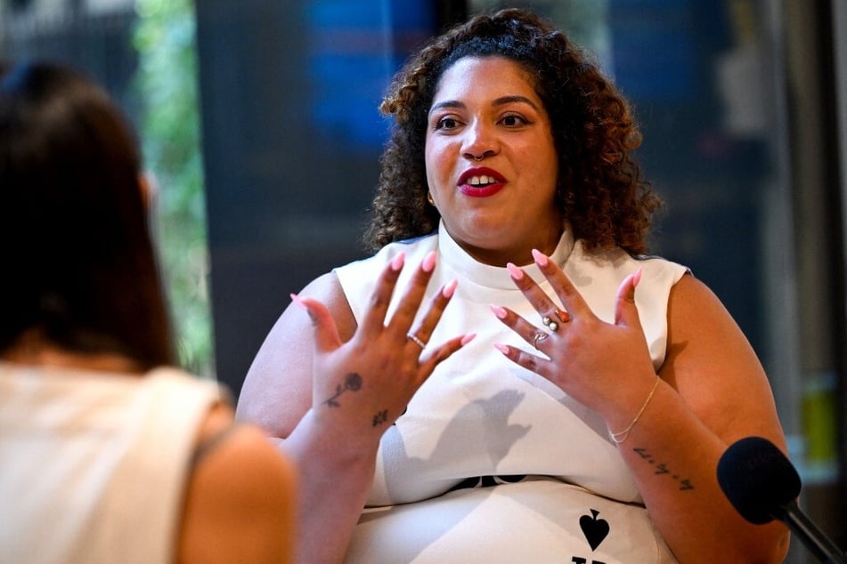 Rolling Stone writer Brittany Spanos speaks to AFP during the Taylor Swift "Swiftposium" at the University of Melbourne on February 12, 2024.