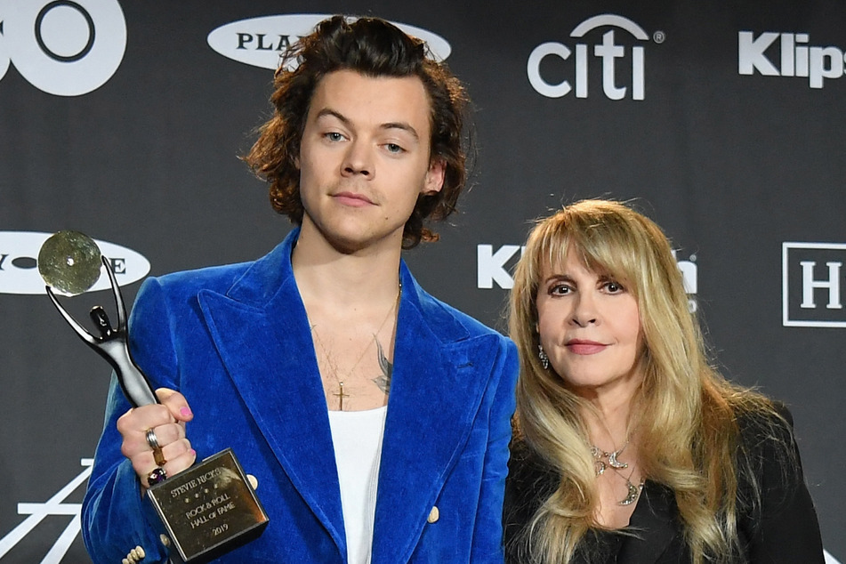 Harry Styles (l.) joined Stevie Nicks on stage during her headlining set at BST Hyde Park on Friday.