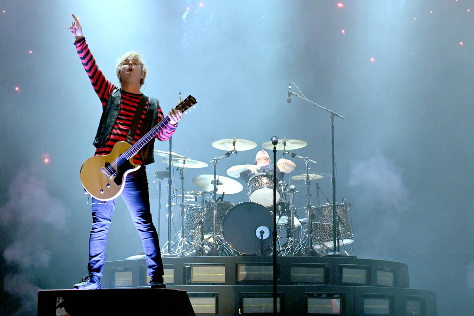 Billie Joe Armstrong (l.) and Tré Cool of Green Day onstage in July 2023.