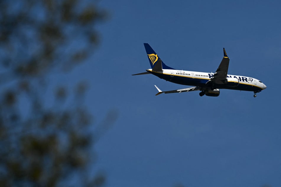 A man was nearly sucked out the window of a Ryanair flight when it "detached" midair.
