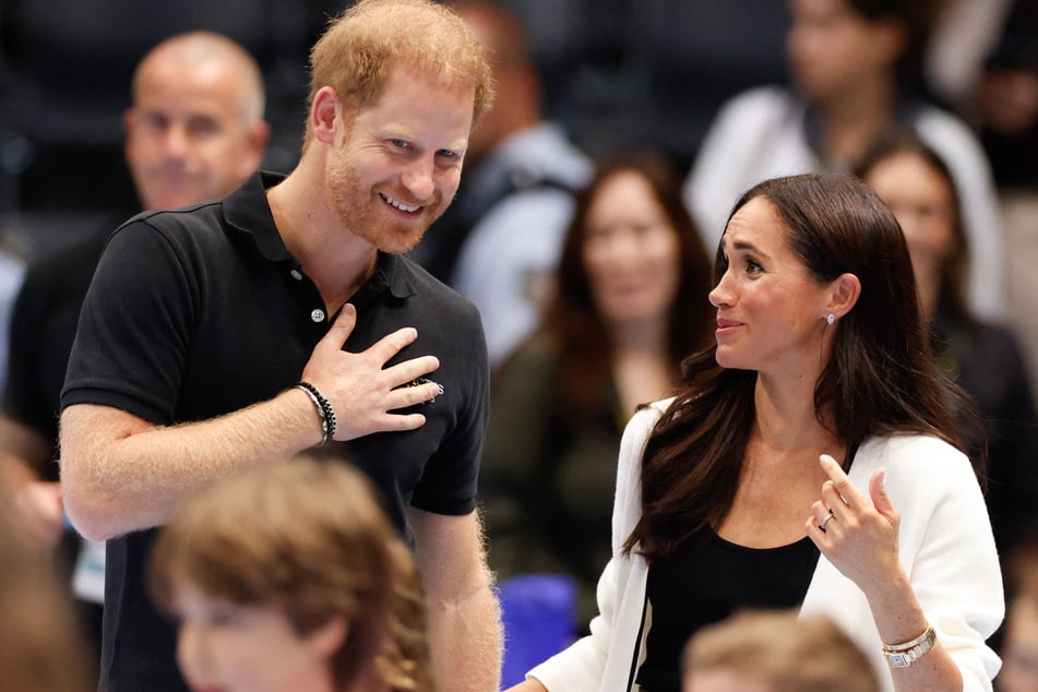 Meghan Markle (r.) is currently not expected to accompany Prince Harry in the UK next month.