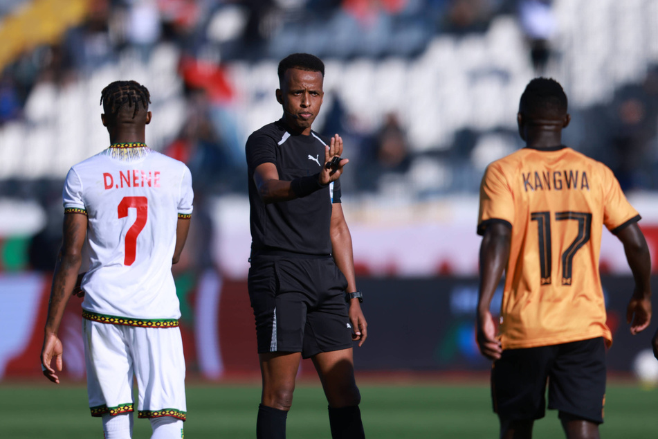 Omar Artan makes a call during the Africa Cup of Nations 2025 Group A match between Mali and Zambia at the Mohammed V Stadium in Casablanca, Morocco, on December 22, 2025.