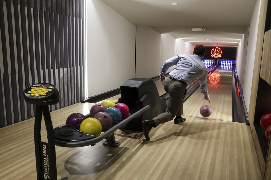 Bowling lanes are seen at Pearl House NYC, a former office building transformed into luxury rental apartments in the Financial District of New York, on April 10, 2026.
