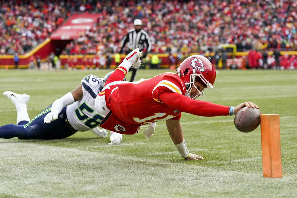 Kansas City Chiefs quarterback Patrick Mahomes scoring a touchdown against the Seattle Seahawks.