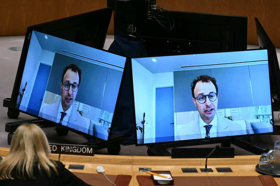 Anthropic CEO Dario Amodei appears by video during a UN Security Council meeting on AI during the 81st UN General Assembly on Wednesday. Amodei similarly called for "stringent standards of safety" when it comes to AI.
