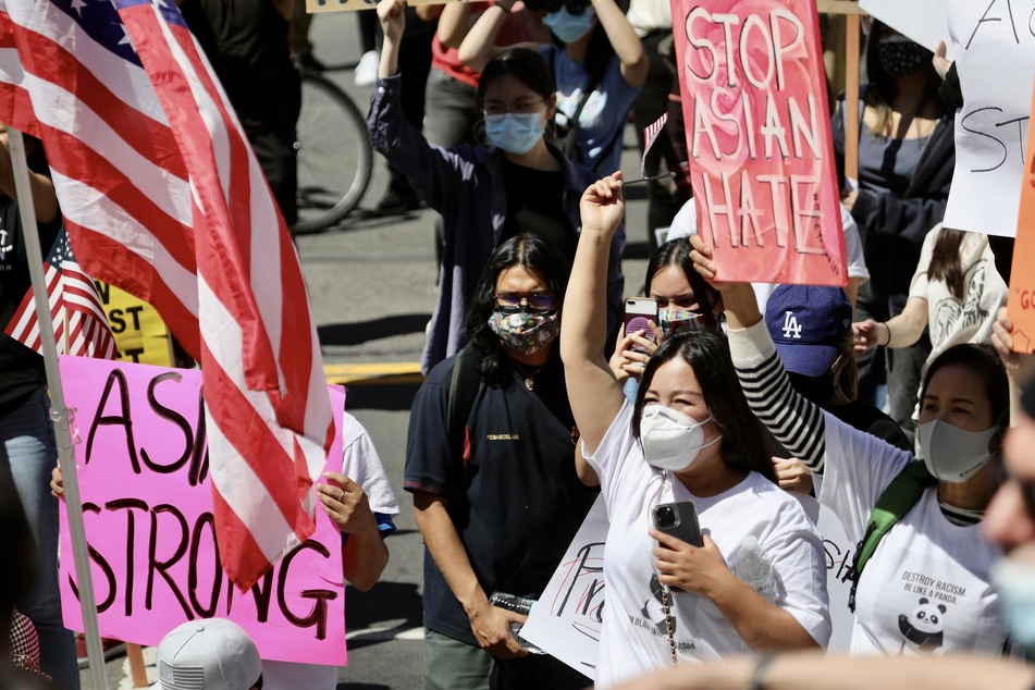 People participated in a Stop Asian Hate rally and march in response to the rising violence against Asian American communities.