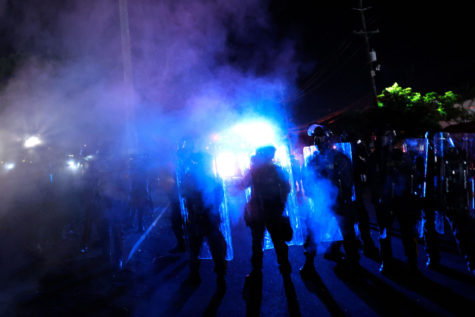 Officers use tear gas on protesters outside the Delaney Hall ICE detention center in Newark, New Jersey, on May 30, 2026.