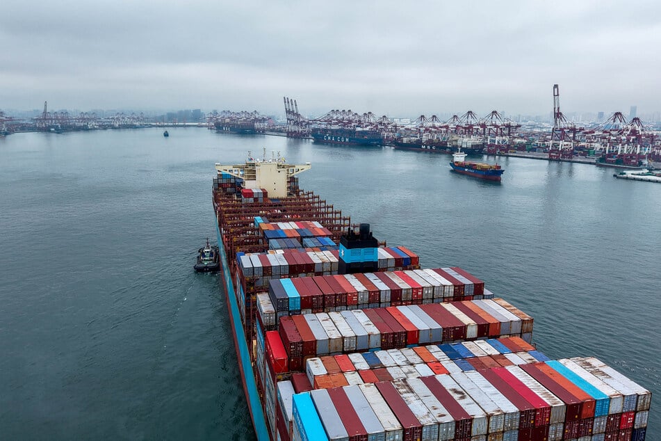 A cargo ship sails into the port of Qingdao, in China’s eastern Shandong province, on July 16, 2026.
