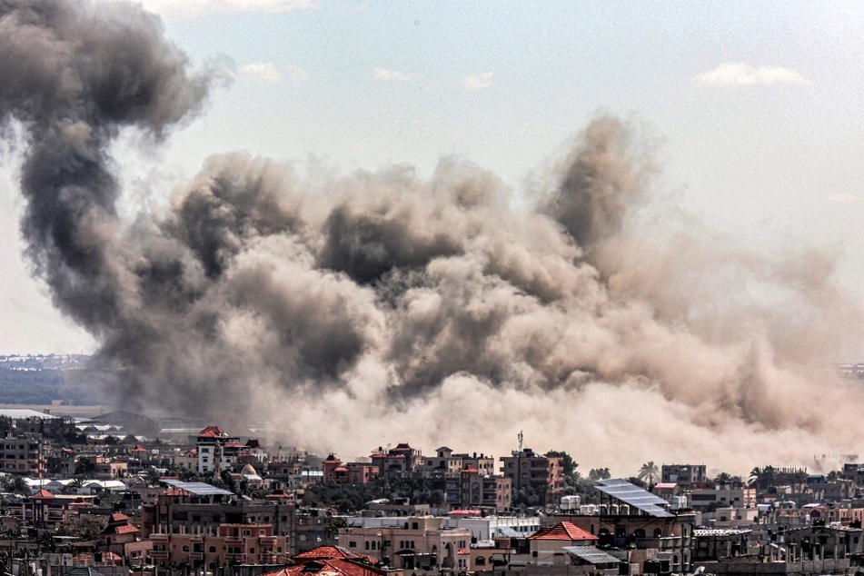 Smoke plumes billow after Israeli bombardment over Rafah in the southern Gaza Strip.