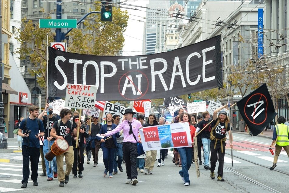 rotesters during a "Stop the AI Race" demonstration in San Francisco, California. Anthropic says it will ban users from treating its Claude AI system with cruelty.