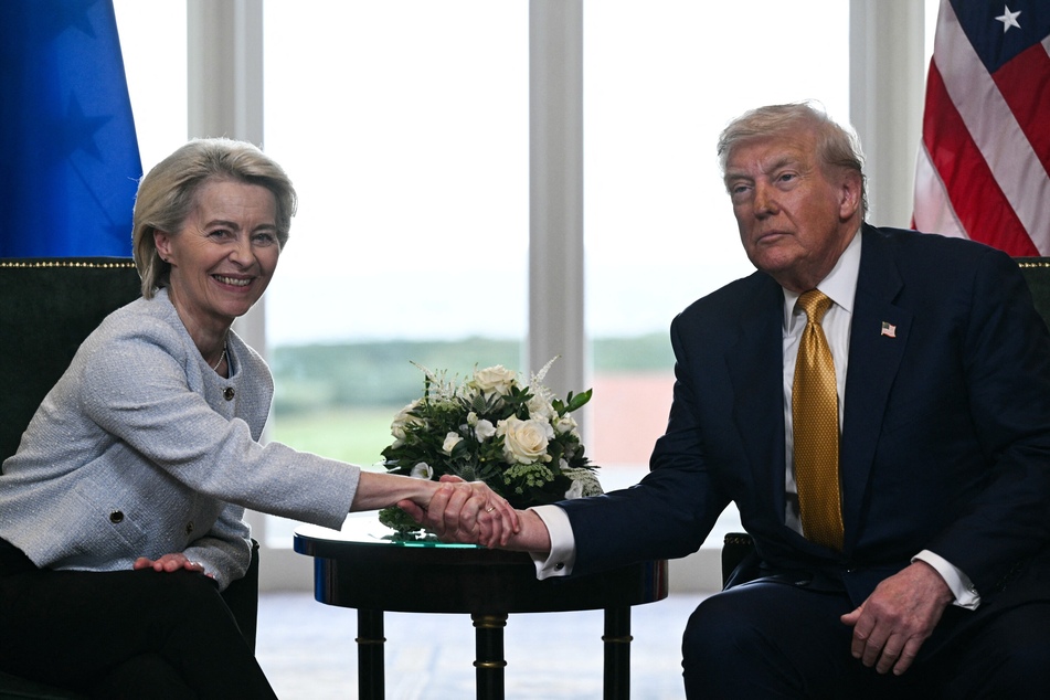 EU agrees to implement US trade pact after Trump threats