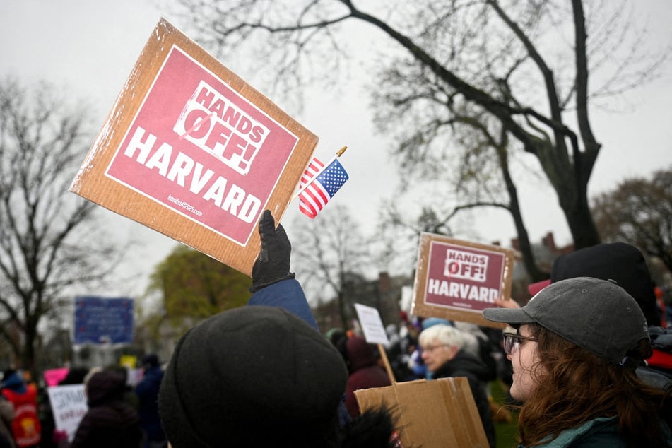Demonstrators rally on Cambridge Common in a protest organized by the City of Cambridge calling on Harvard leadership to resist interference at the university by the federal government.