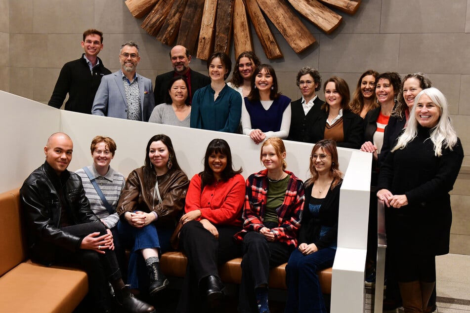 Members of the legal team and some of the 15 plaintiffs of the first youth climate trial in Canada pose at the federal court in Vancouver, British Columbia, on October 26, 2026.