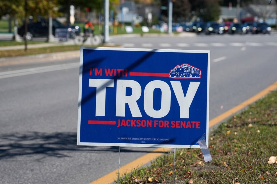 An election sign for Democratic Senate candidate Troy Jackson stands in Portland, Maine, on October 5. Jackson has raised $20.4 million, compared to his Republican opponent's $5.2 million.