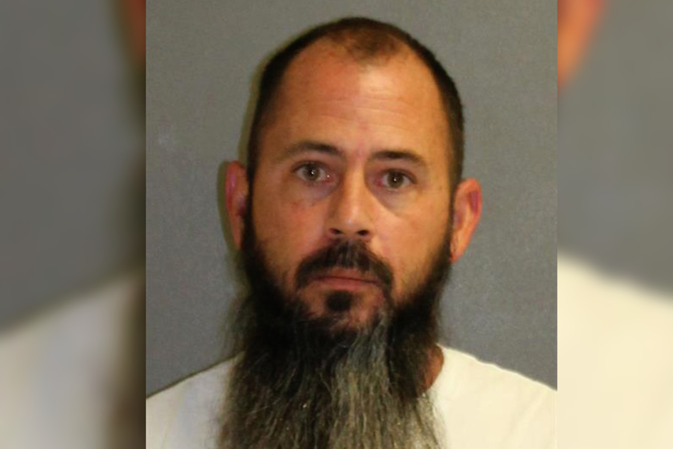 Damian DeRousha (43) is accused of killing 31-year-old Donald Gino.