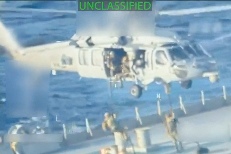 Venezuela accused the US of committing an act of international piracy" as the Trump administration released dramatic footage of the seizure of an oil tanker.