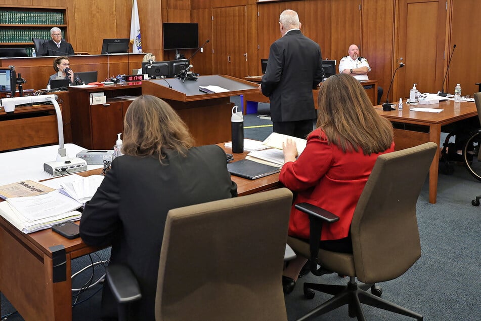 Attorney Kevin Reddington (r.) speaks during a court appearance for Lindsay Clancy's murder trial.