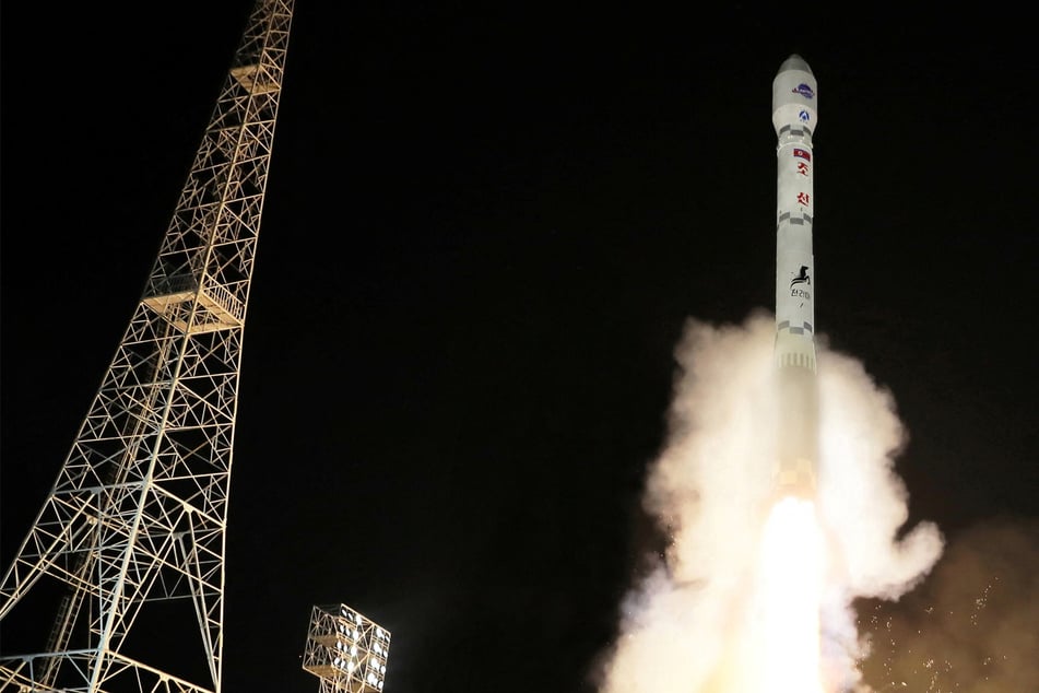North Korea fires missile and axes military agreement after spy satellite launch