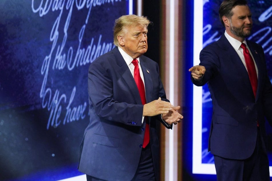 Vice President JD Vance (r.) welcomes President Donald Trump to the stage on the second day of the 2026 Republican National Convention on September 10, 2026 in Dallas, Texas. Buzz has been spreading around Vance's possible presidential run.