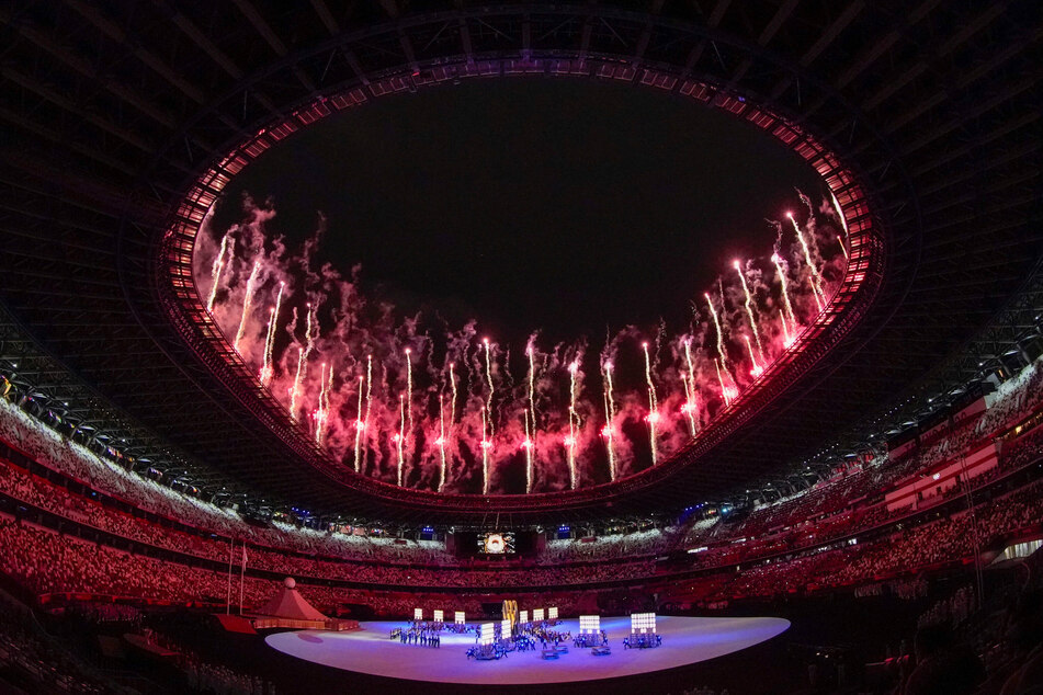 Tokyo Olympics: Naomi Osaka lights cauldron in quiet opening ceremony