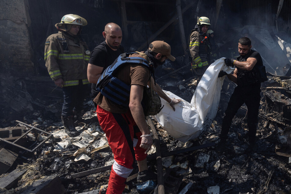 Russia pummels Kharkiv with missiles in "brutal attack" as Zelensky asks to use US weapons