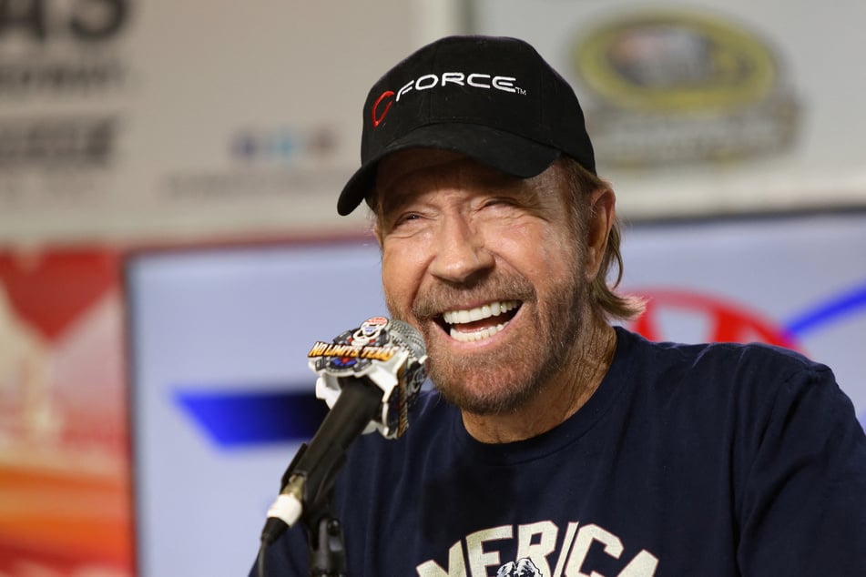Actor Chuck Norris speaks with the media during a press conference prior to the NASCAR Sprint Cup Series AAA Texas 500 at Texas Motor Speedway on November 6, 2016 in Fort Worth, Texas.