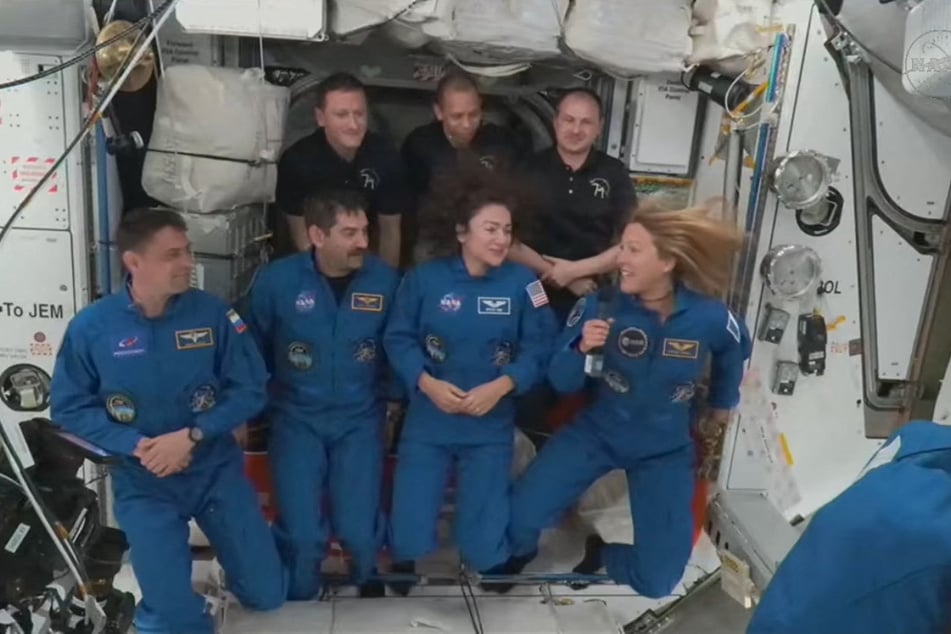 International crew finally blast off to space station after weather delay