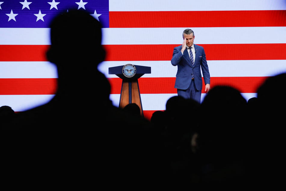 Defense Secretary Pete Hegseth delivers the State of the Force address on September 30. He confirmed a massive purge of the military's top generals and admirals.