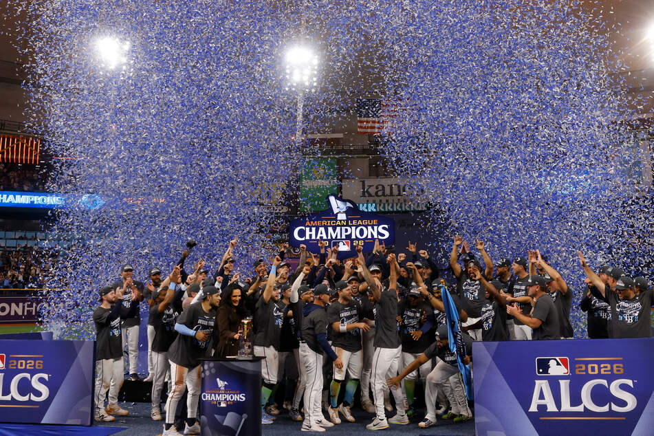 The Tampa Bay Rays celebrate after winning the American League Championship Series at Tropicana Field on October 19. The team was briefly moved to a minor-league ballpark while hurricane damage to Tropicana was repaired.