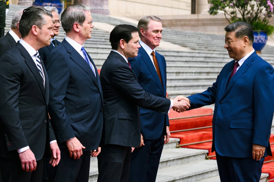 Secretary of State Marco Rubio's (l) decision to designate Min Zin a "wrongfully detained" person comes on a month before Chinese President Xi Jinping (r) will visit Washington DC.