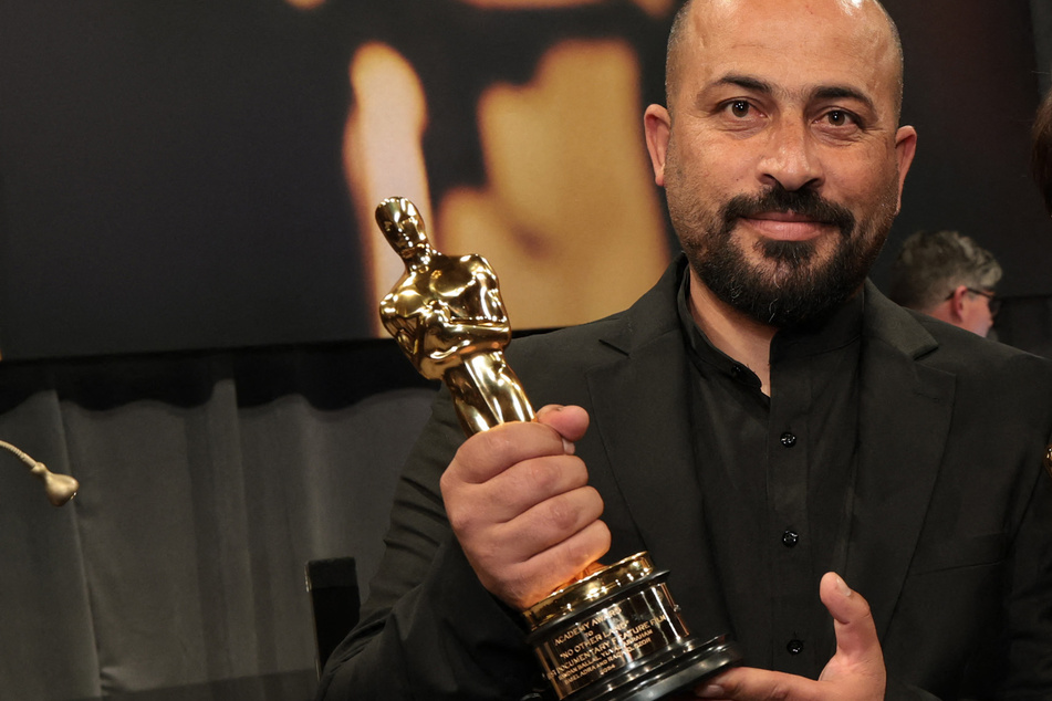 Palestinian director of Oscar-winning film beaten by Israeli settlers and troops