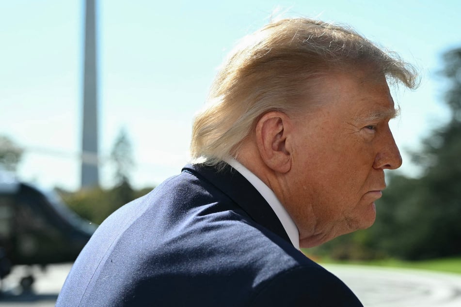 President Donald Trump speaks to the media before boarding Marine One on the South Lawn of the White House in Washington DC on Friday. The US Conference of Catholic Bishops recently denied being involved in the president's group prayer session.