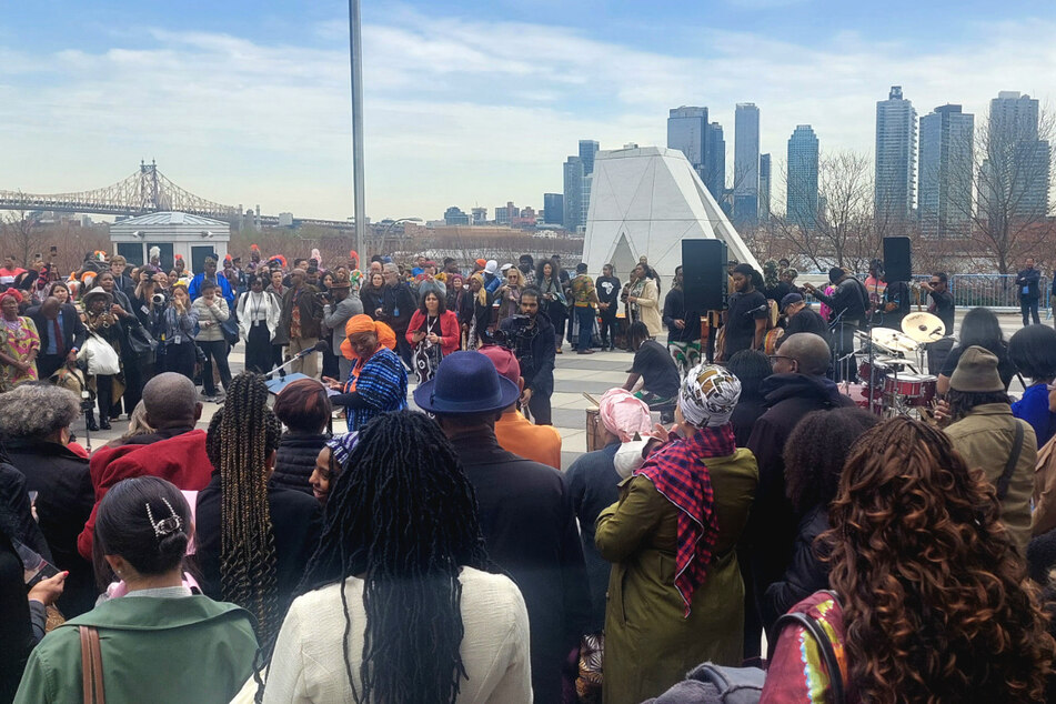 Attendees of the Permanent Forum on People of African Descent gather outside the UN headquarters in New York City for drum and dance performances.
