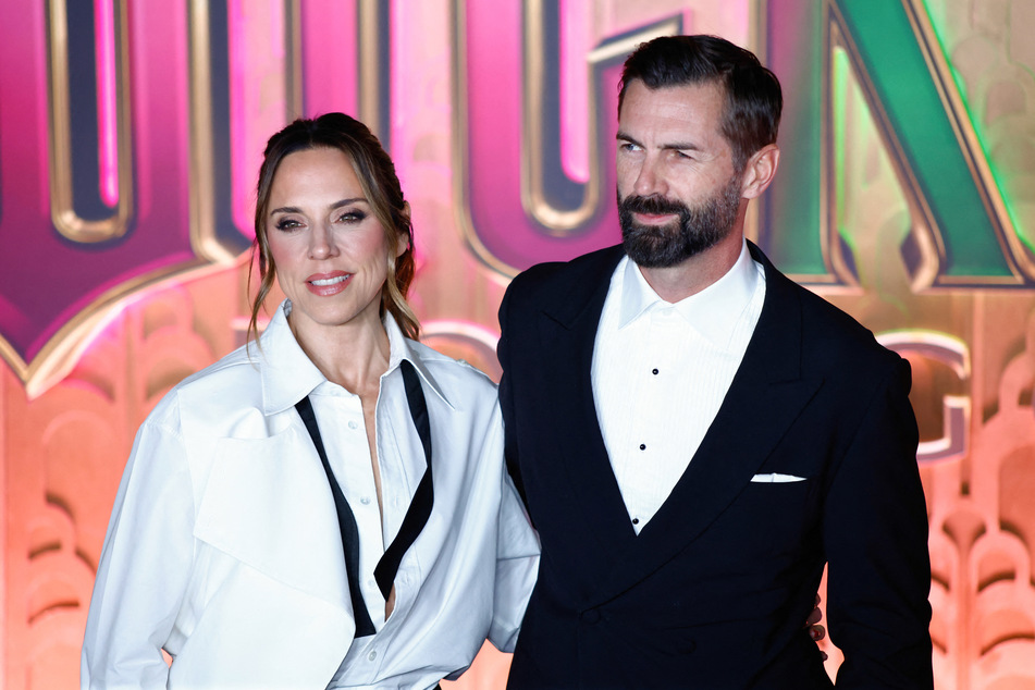 Mel C (l) and her partner Chris Dingwall said “I do."