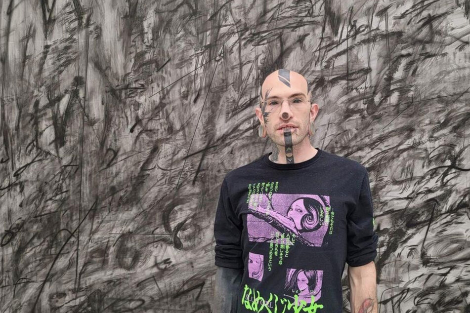 After having his nose and nipples removed, tattoo artist Odin has faced trouble.