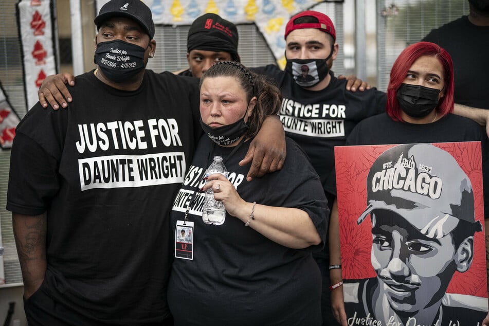 Daunte Wright's parents, Aubrey Wright (l.) and Katie Bryant, join protesters in calling for accountability for their son's killing.