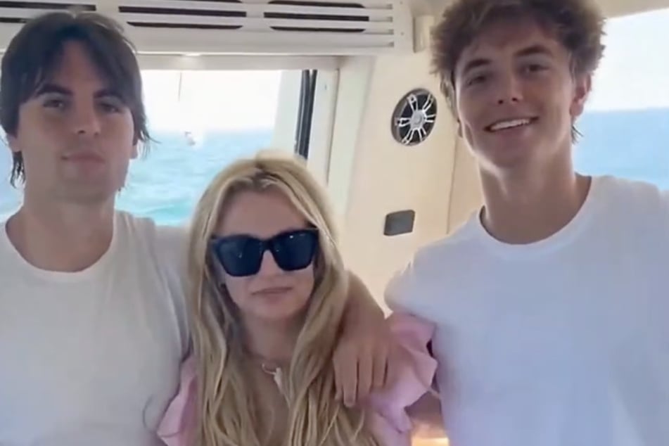 Britney Spears (c.) shared rare pics of her son Jayden (r.) and Sean Preston in honor of their recent birthdays.