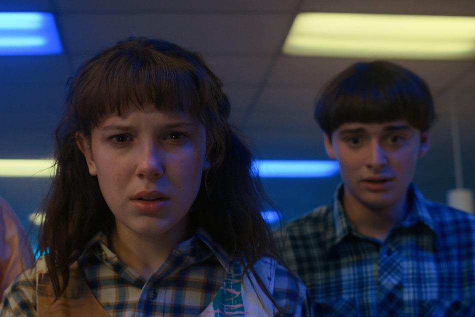 Millie Bobby Brown and Noah Schnapp co-star as Eleven and Will, respectively, on Netflix's Stranger Things.