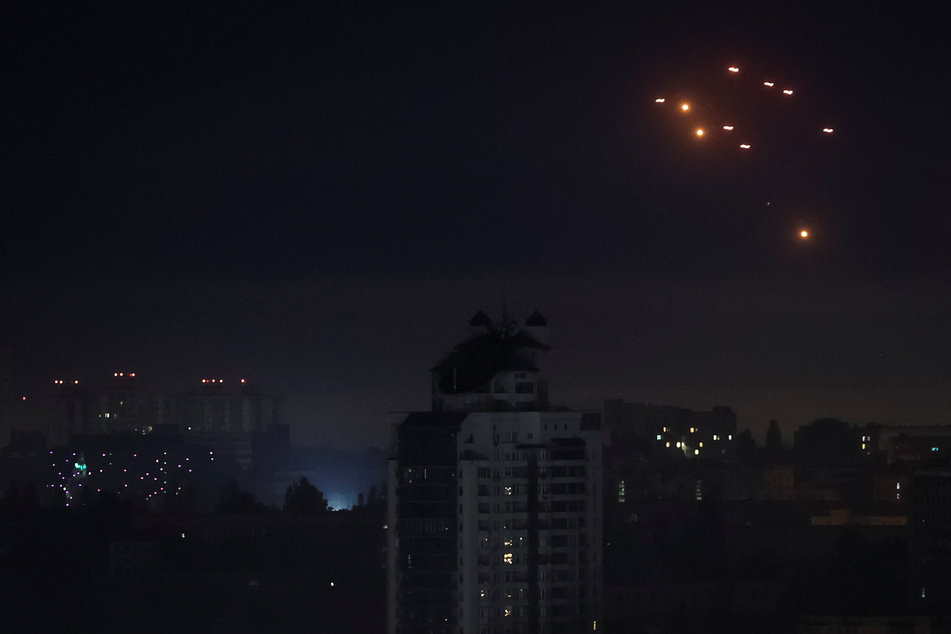 Ukrainian cities were hit by a record number of Russian drones in an attack that killed at least 13 people.