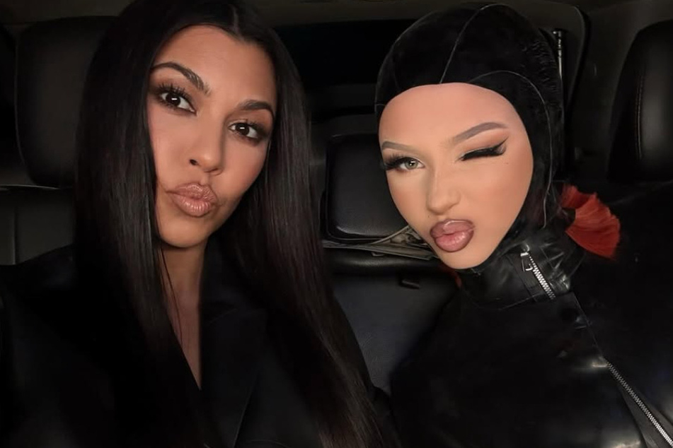 Kourtney Kardashian made a stylish cameo in Alabama Barker's (r.) music video.