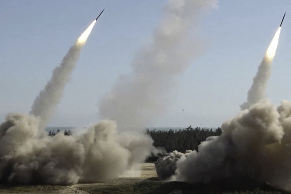 Chinese forces take part in long-range live-fire drills targeting waters south of Taiwan on December 30, 2025.