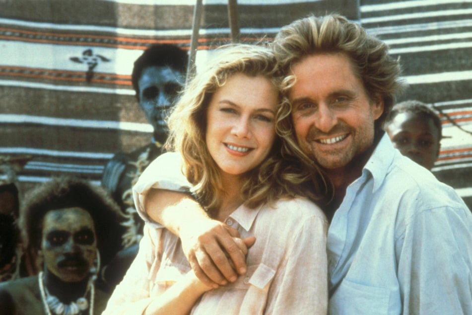 Michael Douglas (r.) and Kathleen Turner were romantically involved off-screen while filming 1984's Romancing the Stone.