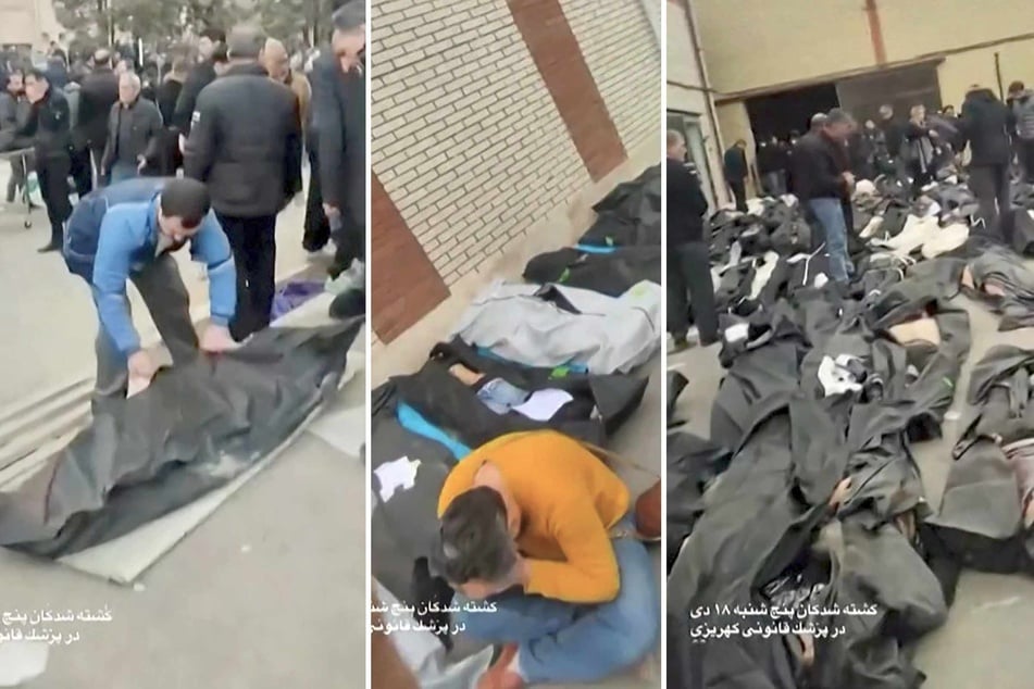 These video grabs taken from UGC images on January 12, 2026, and first published online on January 10, 2026 (verified by AFPTV teams in Paris on January 11, 2026) show the courtyard of the Forensic Diagnostic and Laboratory Center of Tehran Province in Kahrizak with dozens of bodies in body bags laid out for family members.