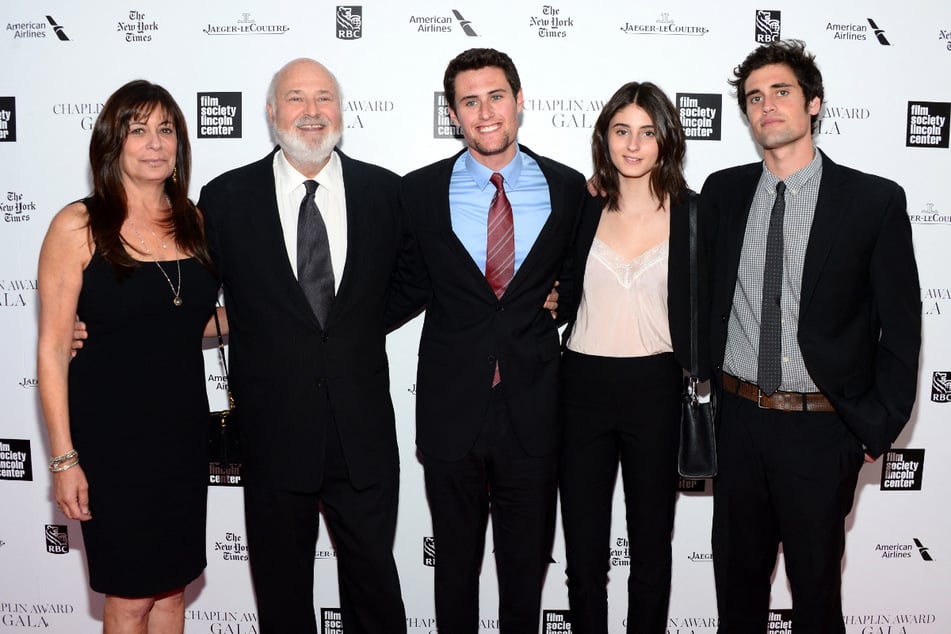 Nick Reiner (r) is accused of killing his parents, Rob (second from l) and Michelle (l), in December 2025. 
